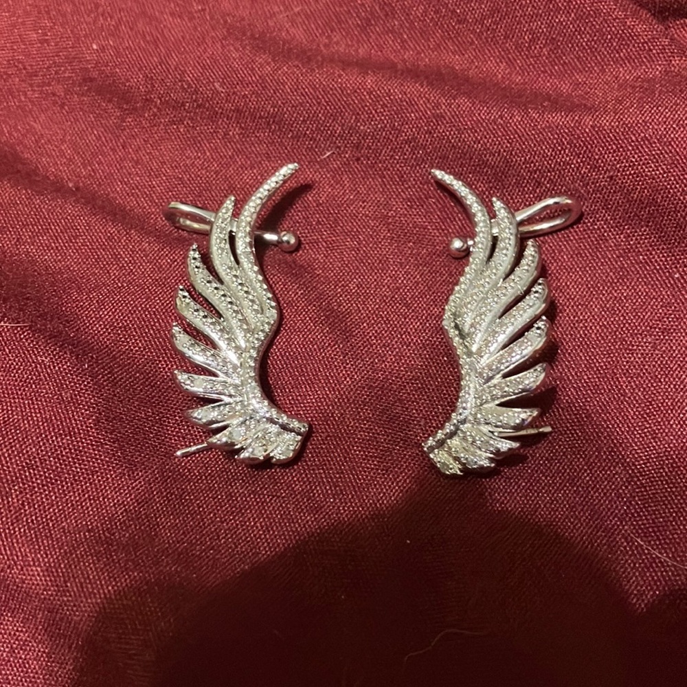 Gorgeous and very unique set of earrings in the shape of angel wings